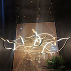 Kussnacht | Creative Gold Wave Chandelier for Dining Room