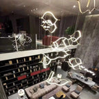 Kussnacht | Creative Gold Wave Chandelier for Dining Room