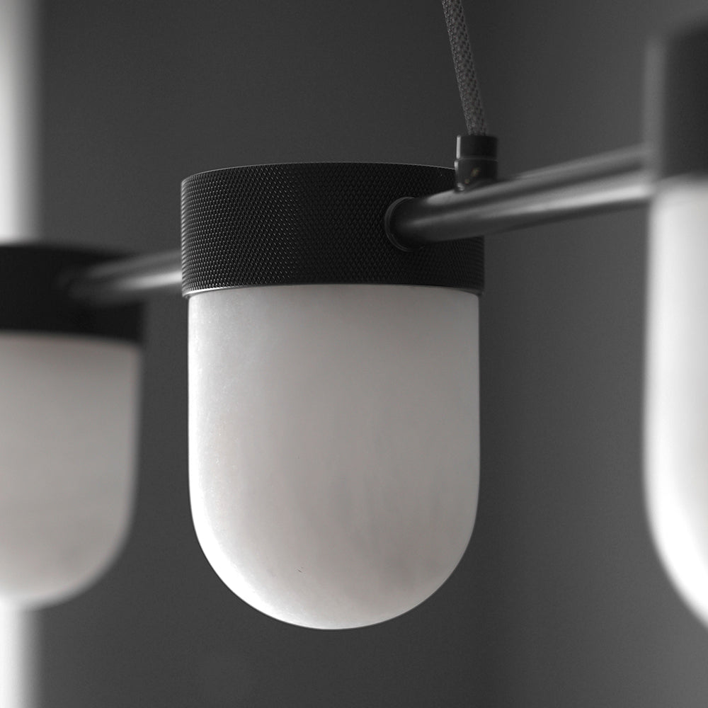 Chic Marble Linear Chandelier Over Dining Table with Hanging Chain